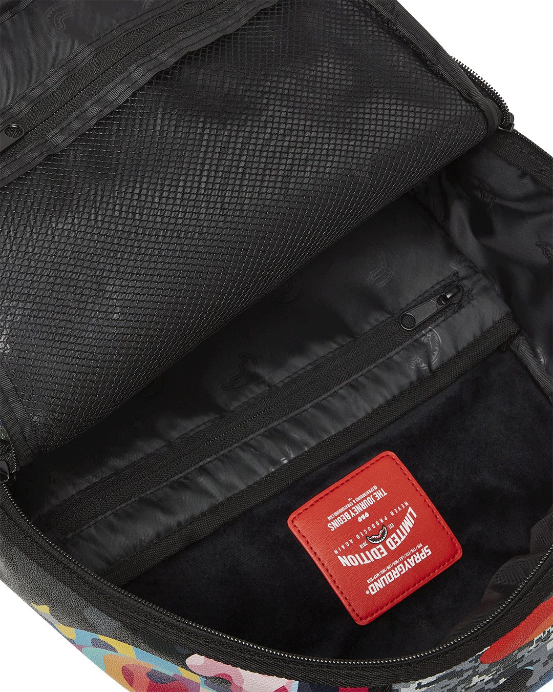 SLICED AND DICED CAMO BACKPACK