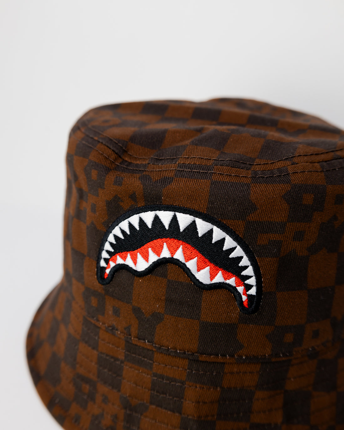SPRAYGROUND BROWN CHECK BUCKET CAP