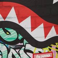 PINK PANTHER PAINTING OVER GRAFFITI DLXR BACKPACK