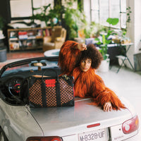 RED REDEMPTION PYRAMID DUFFLE