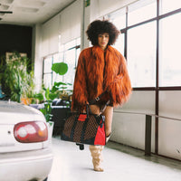 RED REDEMPTION PYRAMID DUFFLE