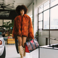 RED REDEMPTION PYRAMID DUFFLE