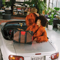 RED REDEMPTION PYRAMID DUFFLE