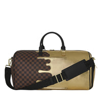 SHARKS IN PARIS GOLD DRIP DUFFLE