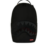 DISAPPEARING SHARK BACKPACK