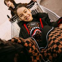CHECKERED CONTRAST OVER PANTS