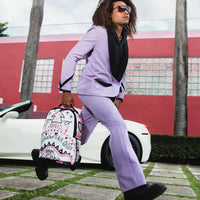 Pink Marker Hits Backpack