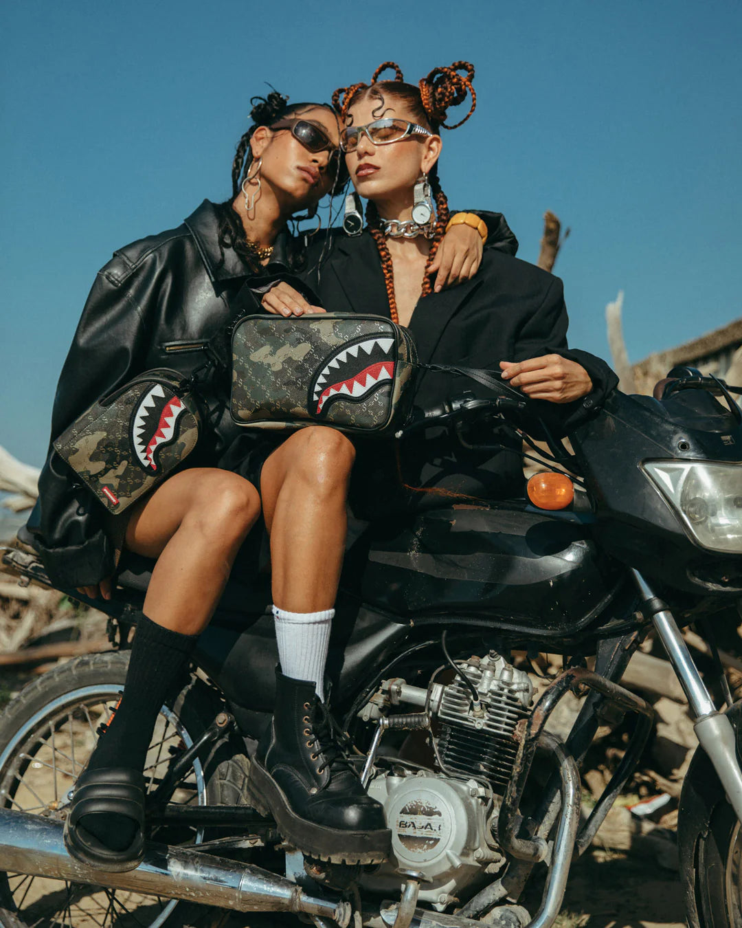 $ PATTERN OVER CAMO SLING BACKPACK