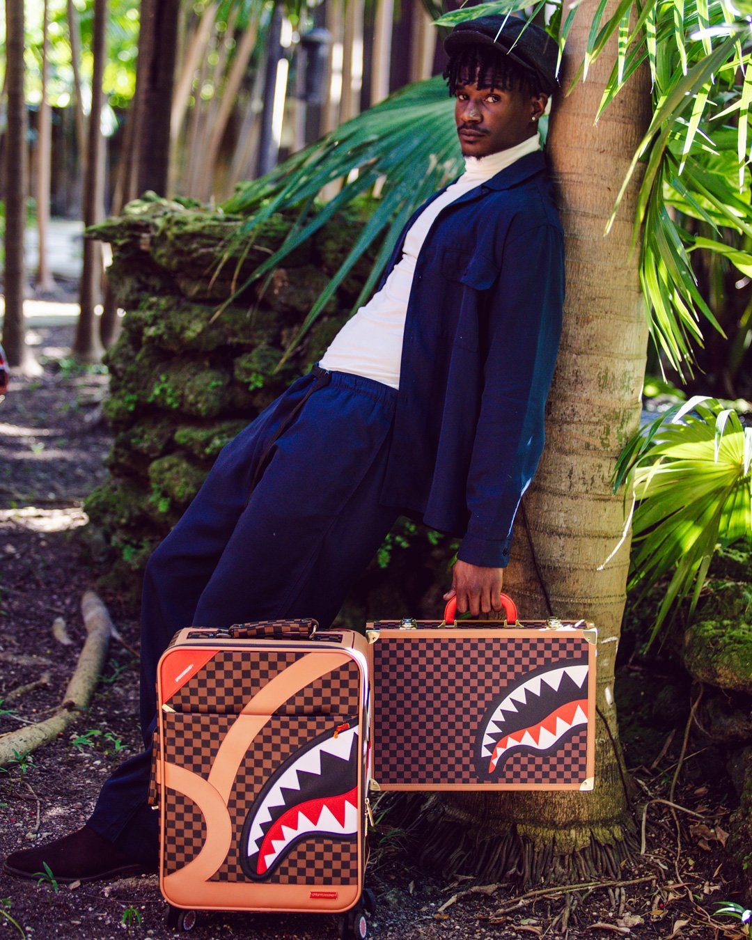 HENNY AIR TO THE THRONE CUT & SEW VEGAN LEATHER CARRY-ON LUGGAGE