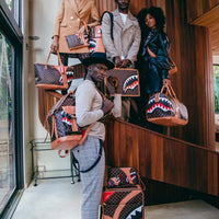 HENNY AIR TO THE THRONE CUT & SEW VEGAN LEATHER CARRY-ON LUGGAGE