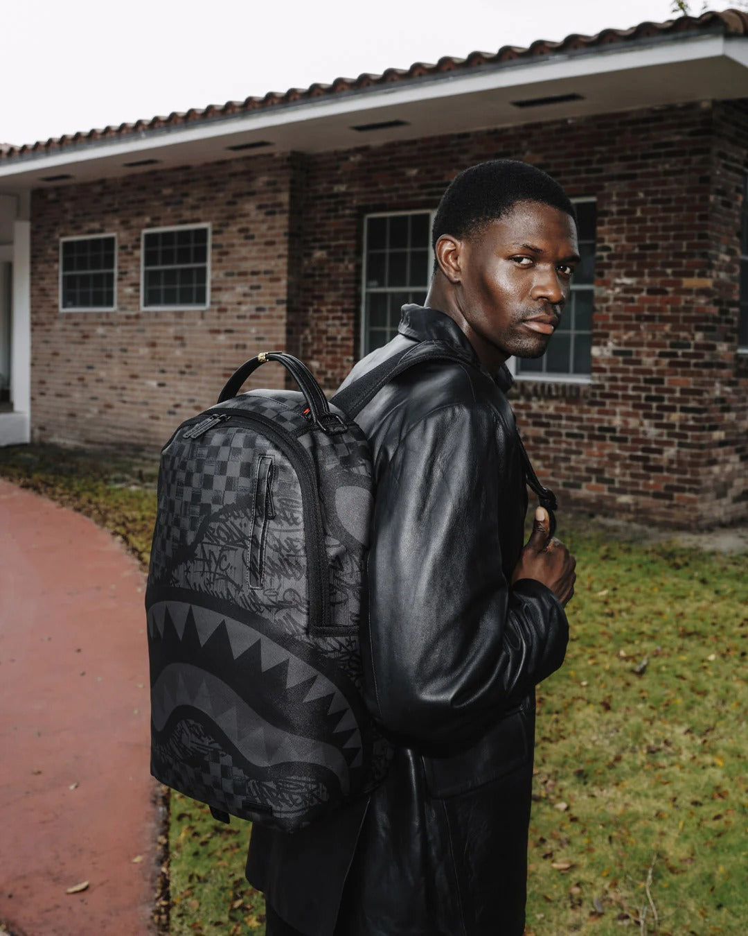 TORN GRAFF CHECK DLXSV BACKPACK