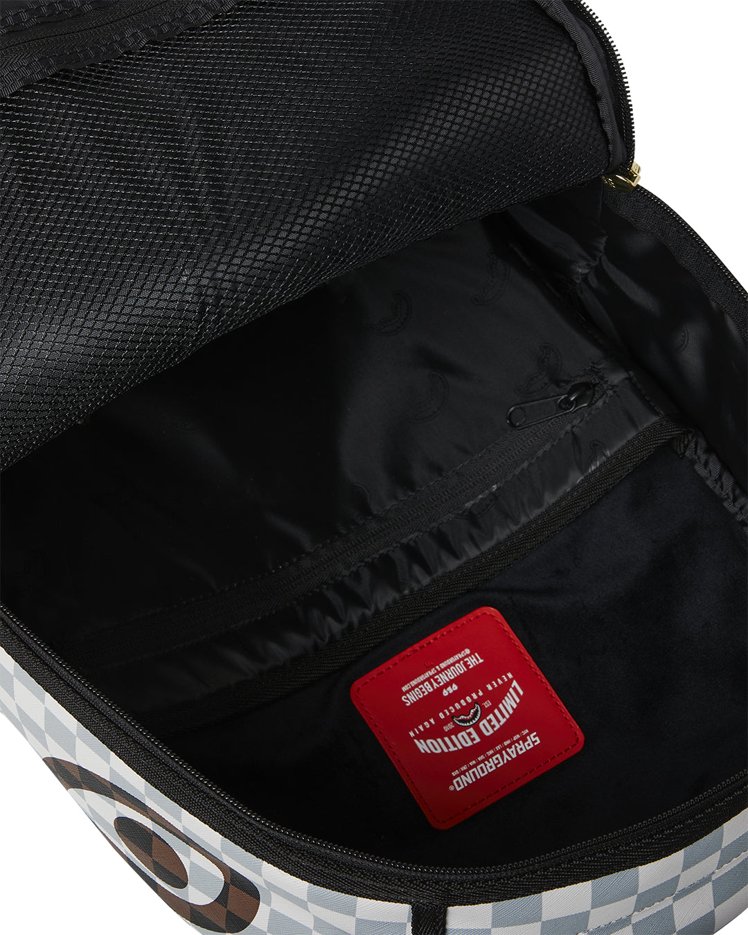 CREAM AND BROWN TEAR CHECK BACKPACK