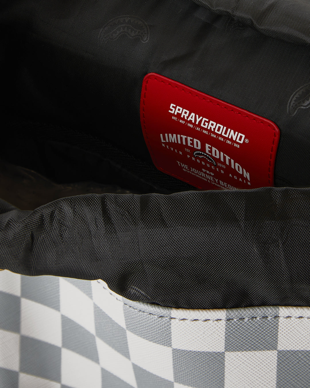 CREAM AND BROWN TEAR CHECK MONTE CARLO BACKPACK