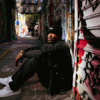 BLACK KNIT PUFF BEANIE