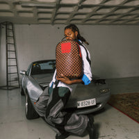 RED REDEMPTION DLXSV BACKPACK