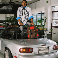 RED REDEMPTION MONTE CARLO BACKPACK