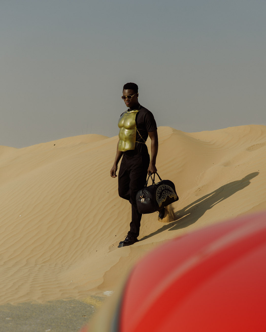 THAT GOLD DRAP DUFFLE