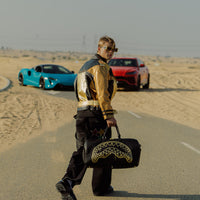 THAT GOLD DRAP DUFFLE