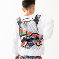 SPRAYGROUND WRITERS BACKPACK IN THE WHITE CREWNECK