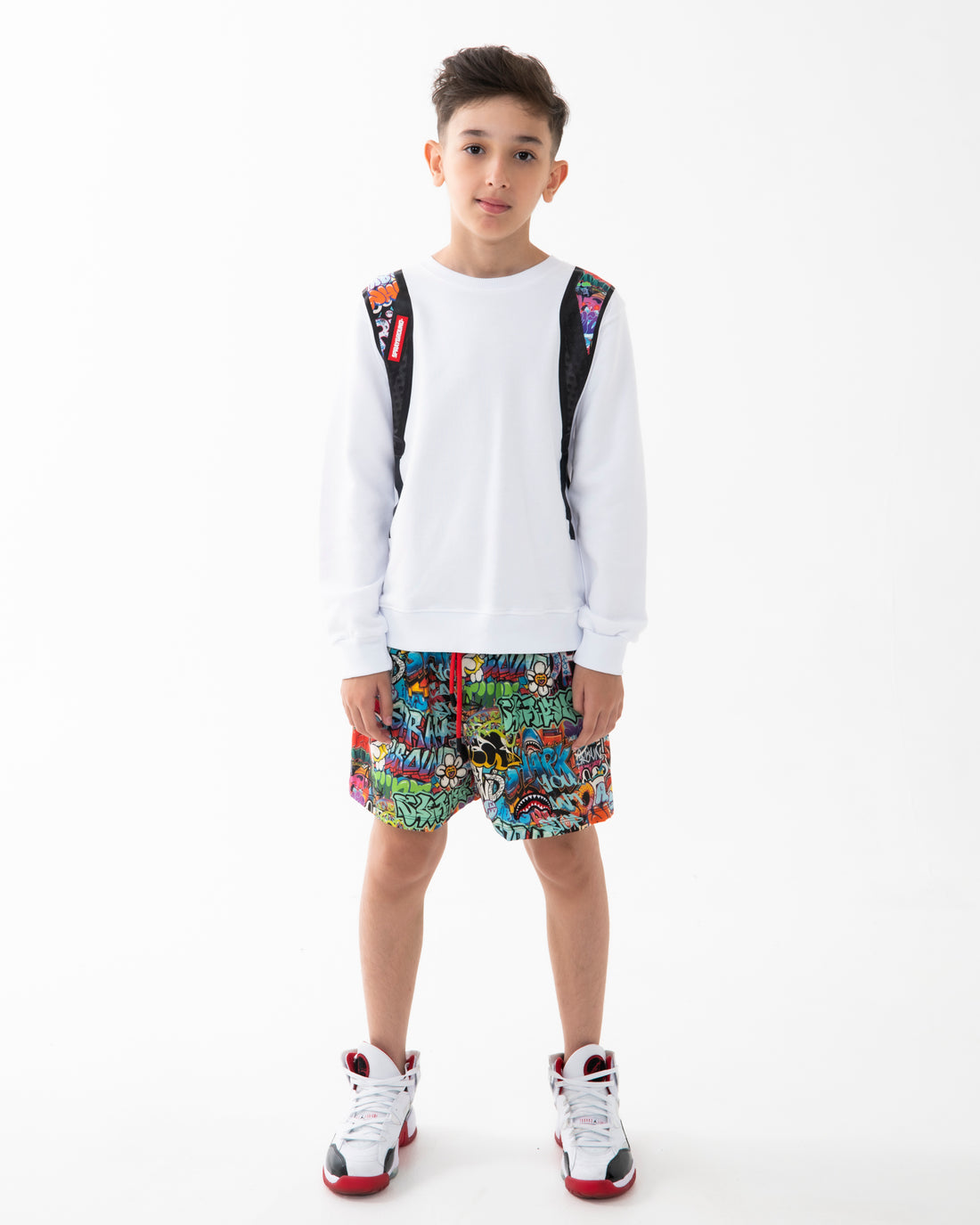 SPRAYGROUND WRITERS BACKPACK IN THE WHITE CREWNECK