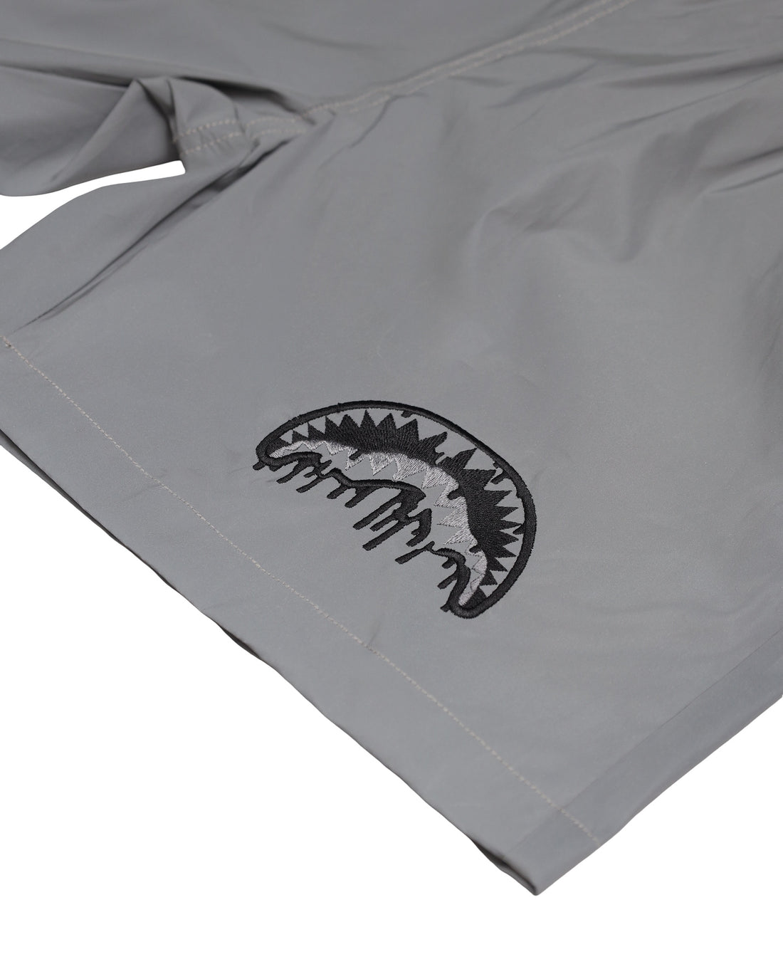 REFLECTIVE DRIP SHARK SWIM TRUNKS