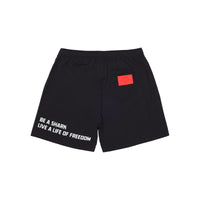 BE A SHARK SWIM TRUNKS