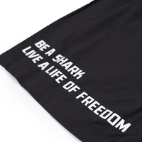 BE A SHARK SWIM TRUNKS