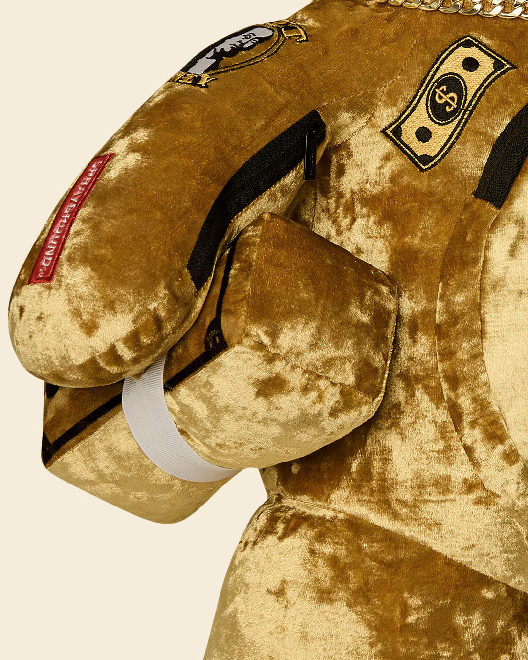 SHARKS IN PARIS GOLD DRIP MONEYBEAR BACKPACK