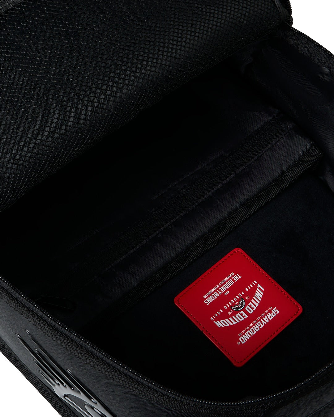 BLACKED OUT METALLIC DRIP BACKPACK