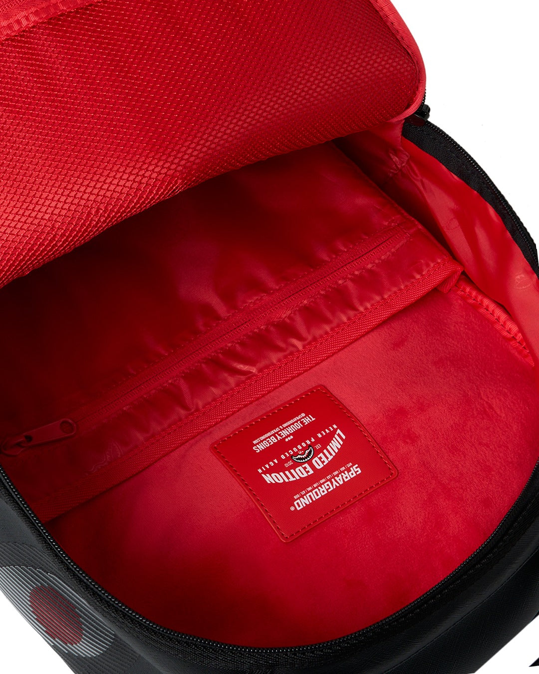 DISAPPEARING SHARK BACKPACK