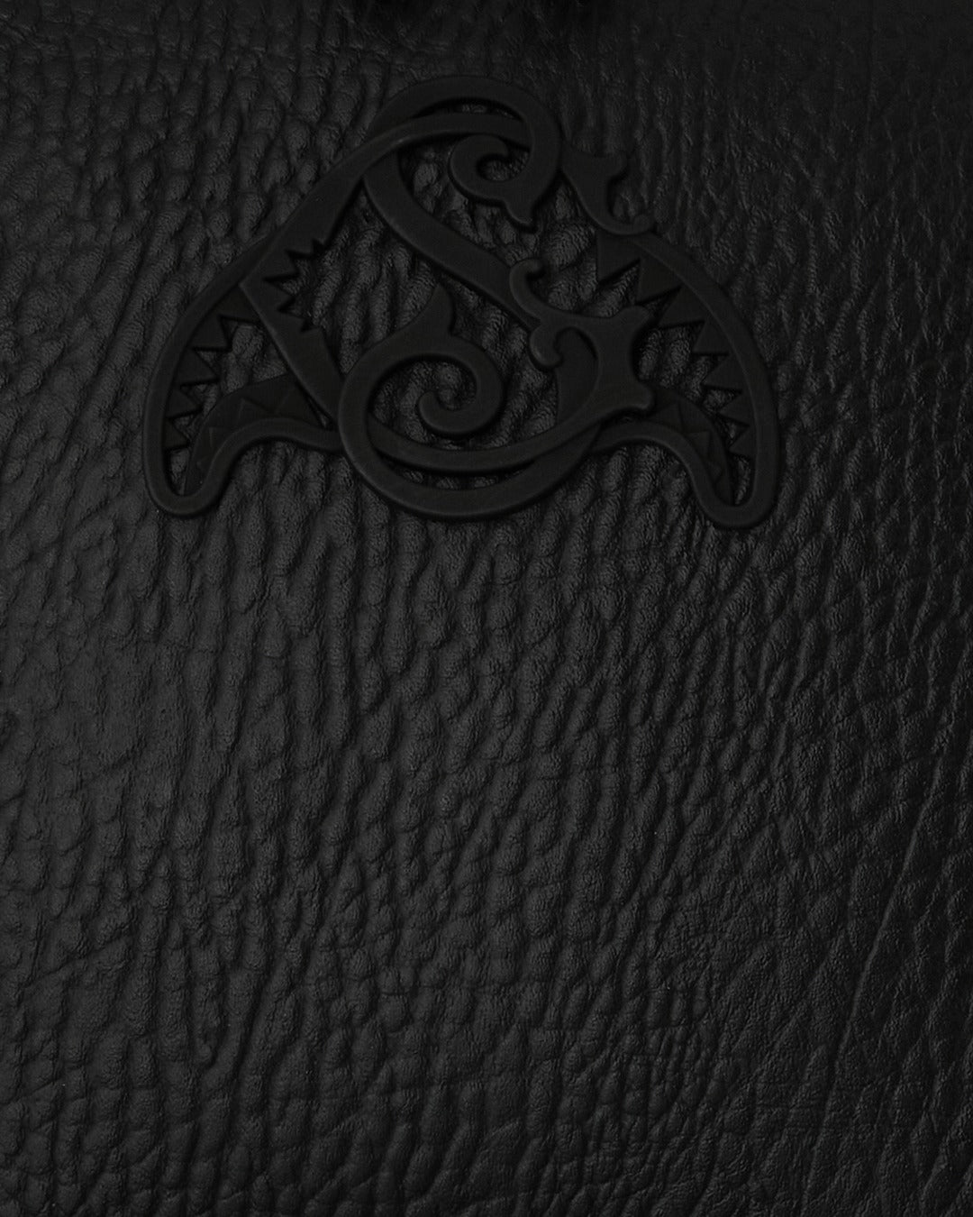 SLEEK BLACK EMBLEM BACKPACK