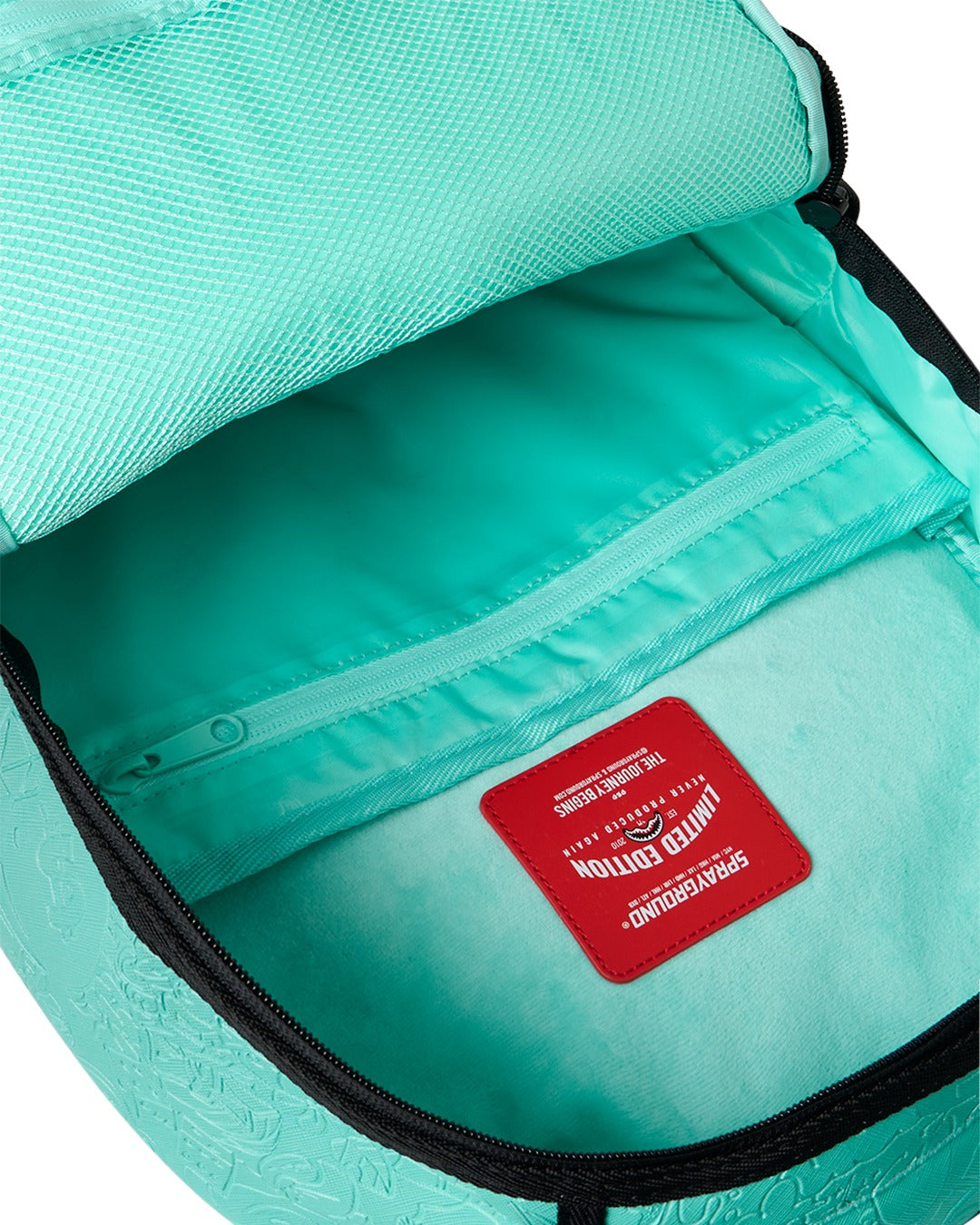 TURQUOISE DOODLE EMBOSS BACKPACK