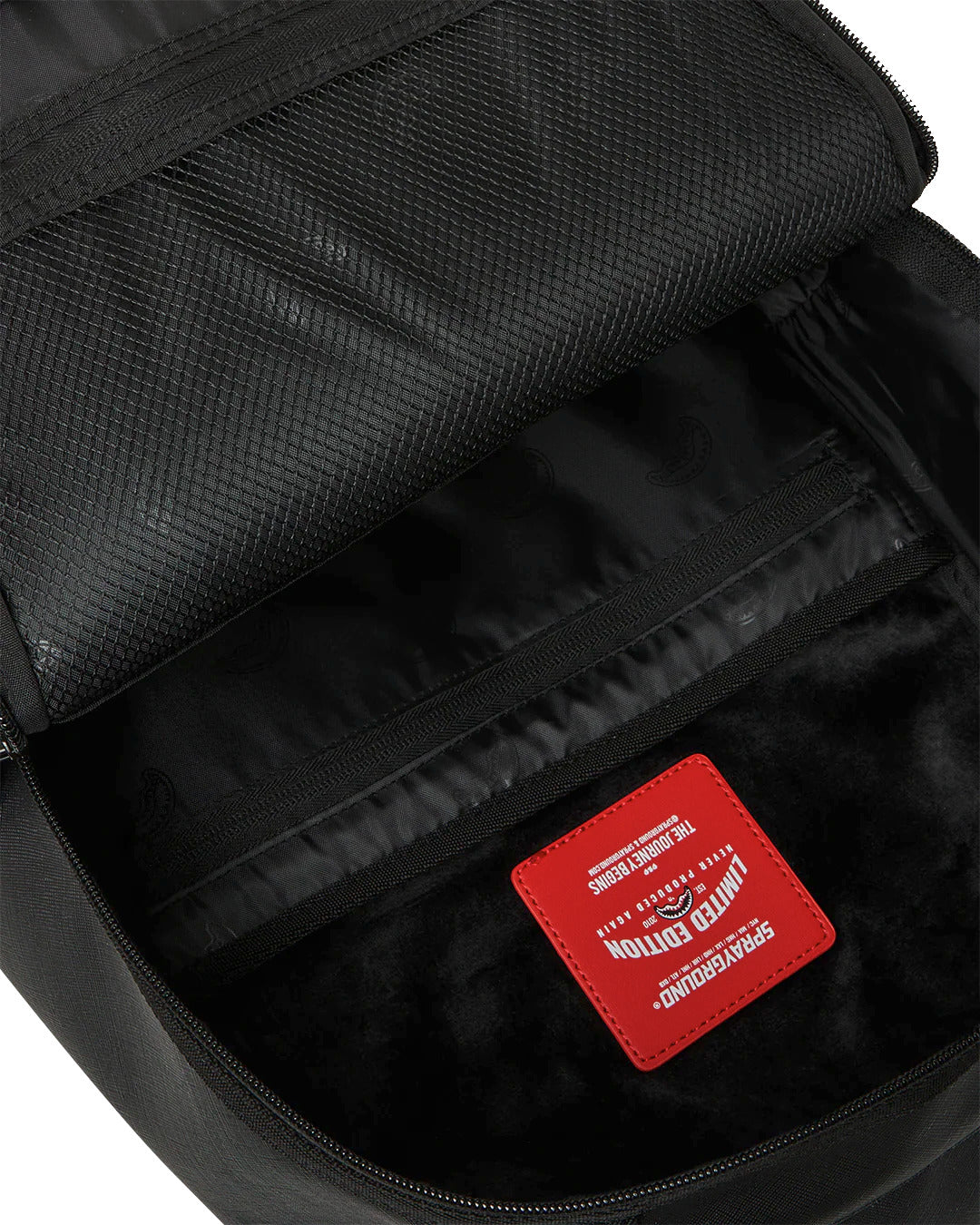 BLACKED OUT EMBOSSED GOLD TOOTH BACKPACK