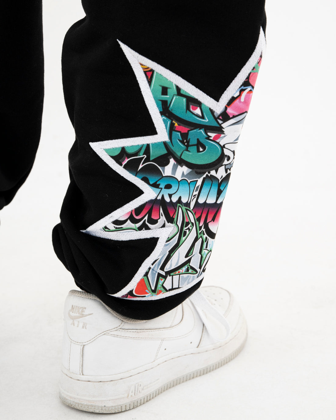 GRAFFITI BITE BAGGY PANTS