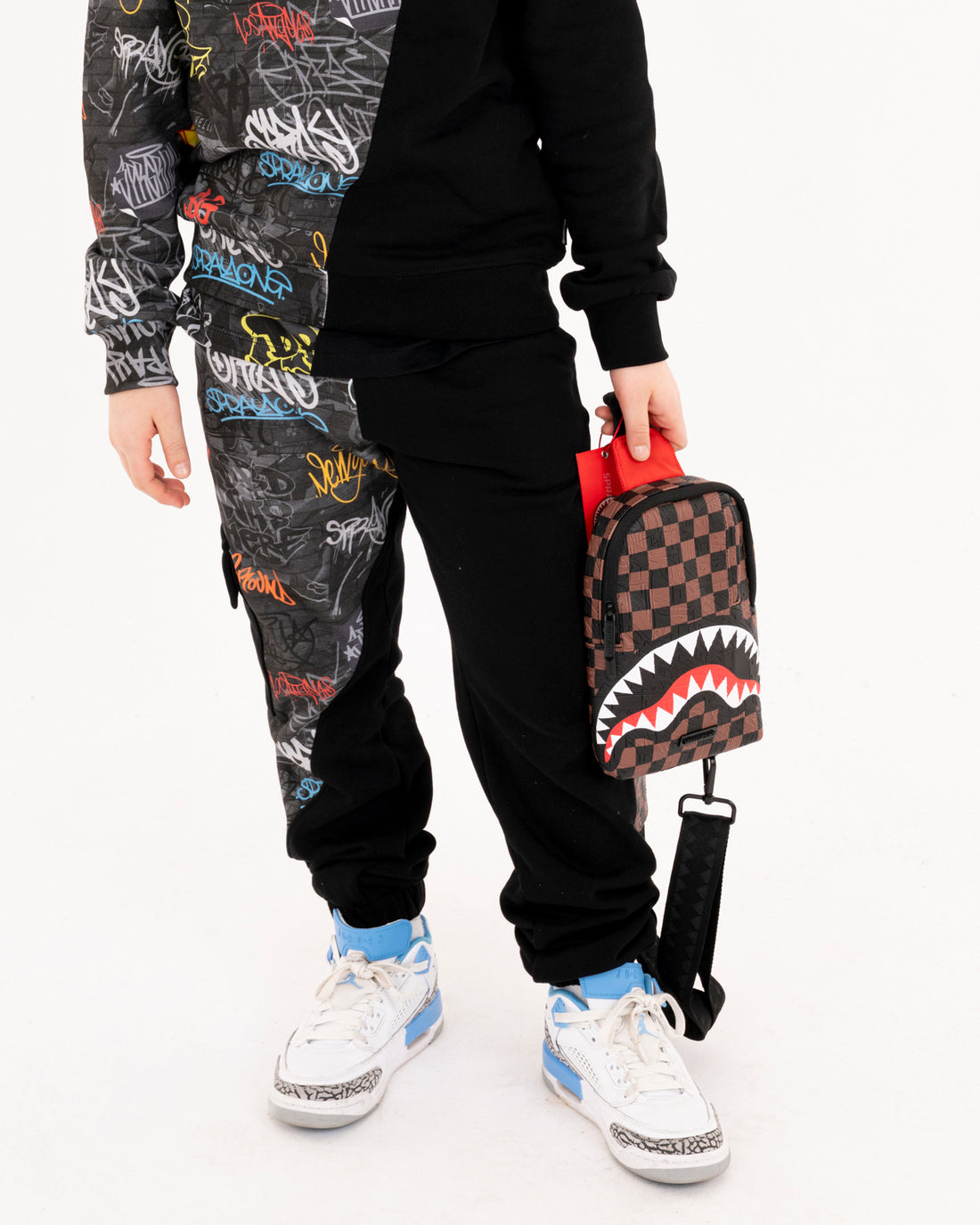 DIAGONAL CUT GRAFFITI PANTS