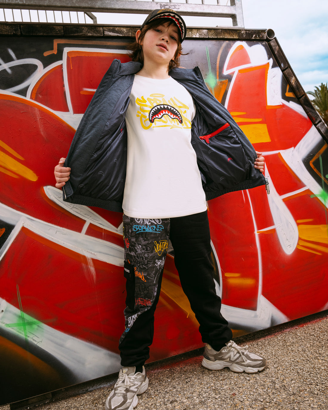 DIAGONAL CUT GRAFFITI PANTS