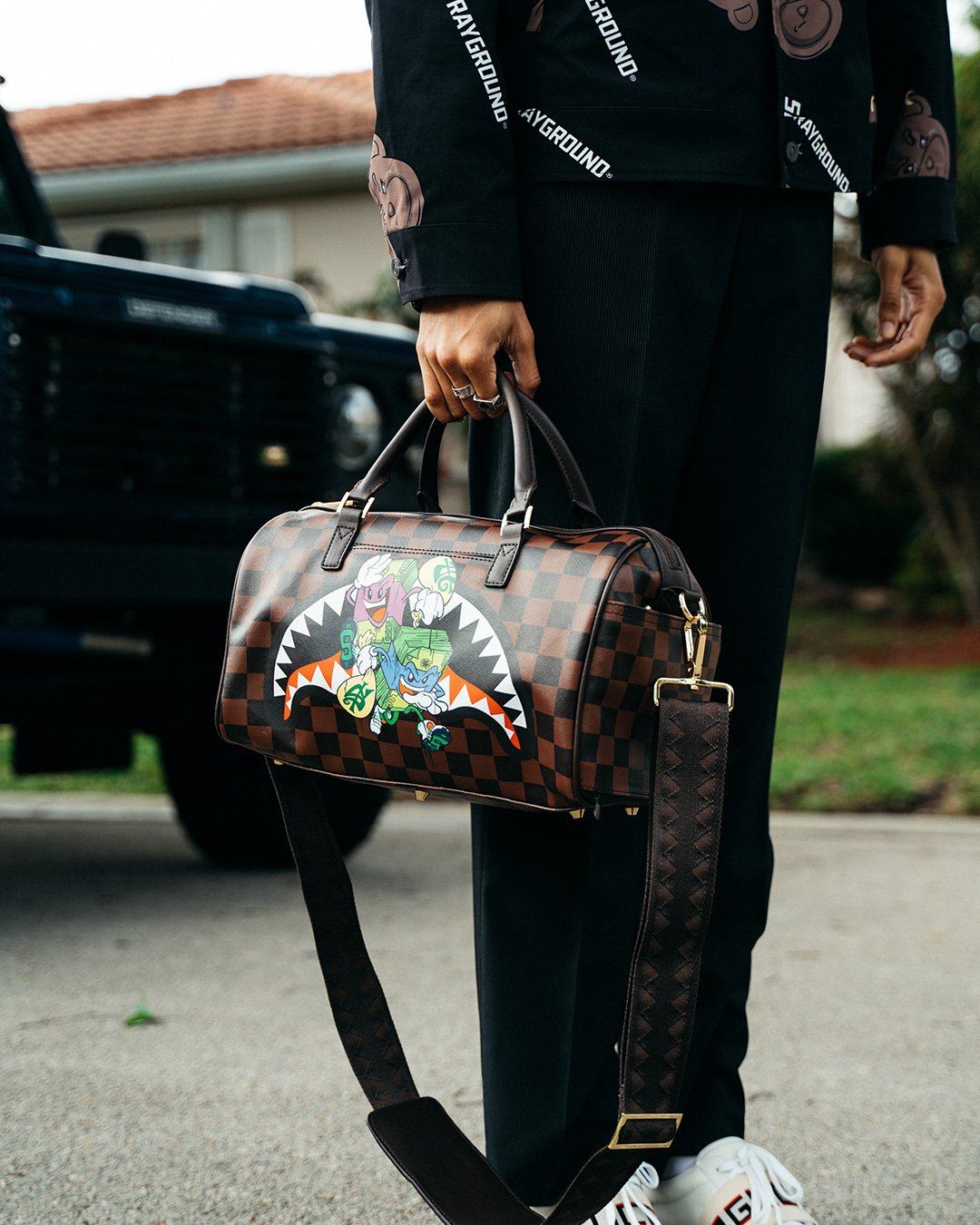 Borsa Sprayground MONEY CHASER MINI DUFFLE Marrone